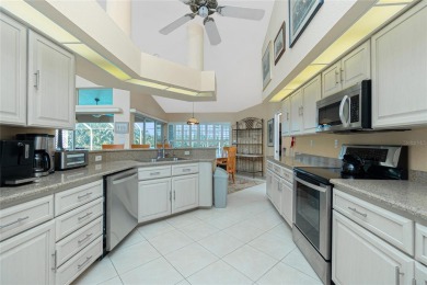 Spacious WATERFRONT home on an oversized lot in desirable deed on Saint Andrews South Golf Club in Florida - for sale on GolfHomes.com, golf home, golf lot