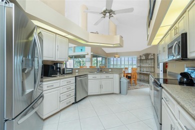 Spacious WATERFRONT home on an oversized lot in desirable deed on Saint Andrews South Golf Club in Florida - for sale on GolfHomes.com, golf home, golf lot