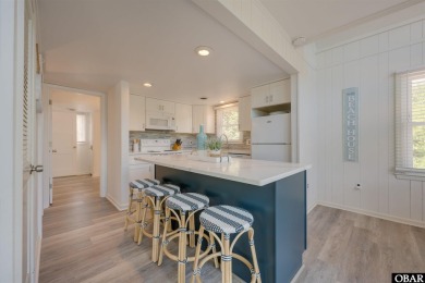 This updated 3-bedroom, 2-bath home is ideally located in the on Seascape Golf Links in North Carolina - for sale on GolfHomes.com, golf home, golf lot