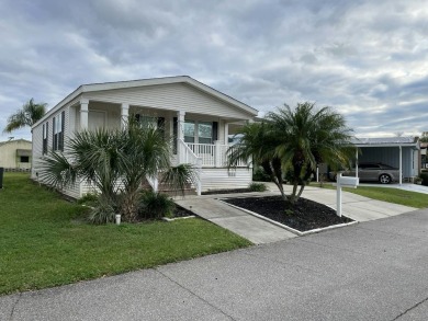 Nestled in the sought-after Lakes at Countrywood 55+ community on Golden Lakes Golf Course in Florida - for sale on GolfHomes.com, golf home, golf lot