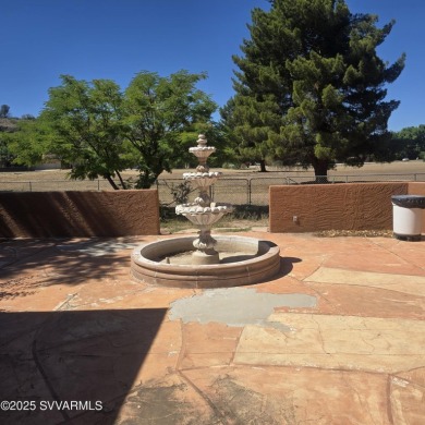 This charming Santa Fe style home is waiting for you to come and on BC Ranch Golf Club in Arizona - for sale on GolfHomes.com, golf home, golf lot