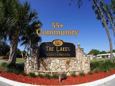 Nestled in the sought-after Lakes at Countrywood 55+ community on Golden Lakes Golf Course in Florida - for sale on GolfHomes.com, golf home, golf lot