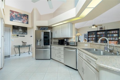 Spacious WATERFRONT home on an oversized lot in desirable deed on Saint Andrews South Golf Club in Florida - for sale on GolfHomes.com, golf home, golf lot