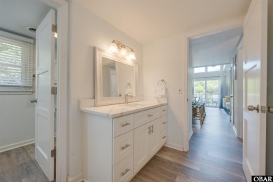This updated 3-bedroom, 2-bath home is ideally located in the on Seascape Golf Links in North Carolina - for sale on GolfHomes.com, golf home, golf lot