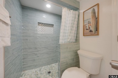 This updated 3-bedroom, 2-bath home is ideally located in the on Seascape Golf Links in North Carolina - for sale on GolfHomes.com, golf home, golf lot