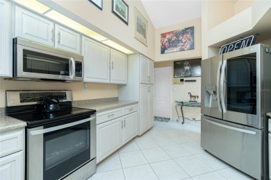 Spacious WATERFRONT home on an oversized lot in desirable deed on Saint Andrews South Golf Club in Florida - for sale on GolfHomes.com, golf home, golf lot