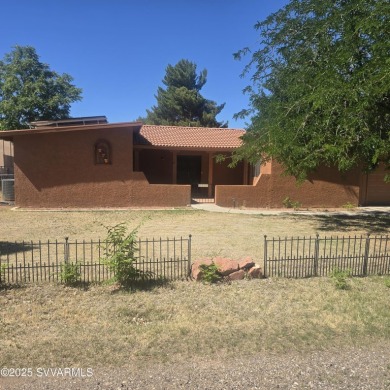 This charming Santa Fe style home is waiting for you to come and on BC Ranch Golf Club in Arizona - for sale on GolfHomes.com, golf home, golf lot
