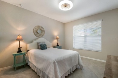 WATERFRONT VILLA IN HIGHLY SOUGHT AFTER ARBOR GRANDE IN LAKEWOOD on Esplanade Golf and Country at Lakewood Ranch in Florida - for sale on GolfHomes.com, golf home, golf lot
