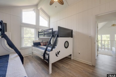 This updated 3-bedroom, 2-bath home is ideally located in the on Seascape Golf Links in North Carolina - for sale on GolfHomes.com, golf home, golf lot