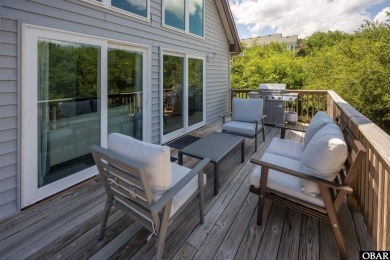 This updated 3-bedroom, 2-bath home is ideally located in the on Seascape Golf Links in North Carolina - for sale on GolfHomes.com, golf home, golf lot
