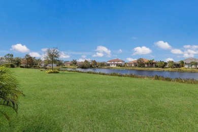 WATERFRONT VILLA IN HIGHLY SOUGHT AFTER ARBOR GRANDE IN LAKEWOOD on Esplanade Golf and Country at Lakewood Ranch in Florida - for sale on GolfHomes.com, golf home, golf lot