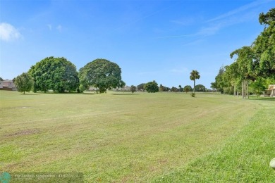 This spacious villa has a beautiful, expansive golf course view! on Colony West Country Club in Florida - for sale on GolfHomes.com, golf home, golf lot