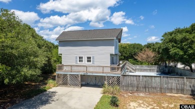 This updated 3-bedroom, 2-bath home is ideally located in the on Seascape Golf Links in North Carolina - for sale on GolfHomes.com, golf home, golf lot