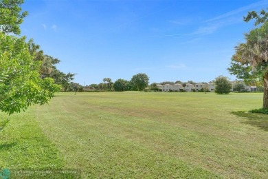 This spacious villa has a beautiful, expansive golf course view! on Colony West Country Club in Florida - for sale on GolfHomes.com, golf home, golf lot