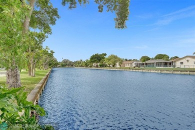 This spacious villa has a beautiful, expansive golf course view! on Colony West Country Club in Florida - for sale on GolfHomes.com, golf home, golf lot