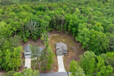 Ready to call this recently built home in Lake Arrowhead yours? on The Highlands Course at Lake Arrowhead in Georgia - for sale on GolfHomes.com, golf home, golf lot