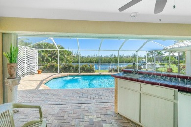 Spacious WATERFRONT home on an oversized lot in desirable deed on Saint Andrews South Golf Club in Florida - for sale on GolfHomes.com, golf home, golf lot