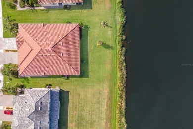 WATERFRONT VILLA IN HIGHLY SOUGHT AFTER ARBOR GRANDE IN LAKEWOOD on Esplanade Golf and Country at Lakewood Ranch in Florida - for sale on GolfHomes.com, golf home, golf lot