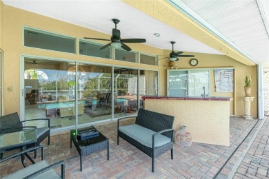 Spacious WATERFRONT home on an oversized lot in desirable deed on Saint Andrews South Golf Club in Florida - for sale on GolfHomes.com, golf home, golf lot