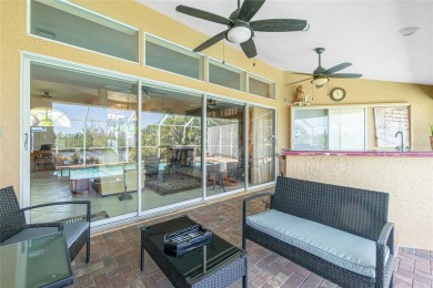 Spacious WATERFRONT home on an oversized lot in desirable deed on Saint Andrews South Golf Club in Florida - for sale on GolfHomes.com, golf home, golf lot