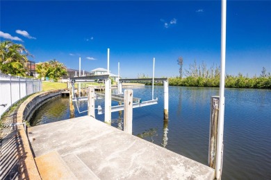 Spacious WATERFRONT home on an oversized lot in desirable deed on Saint Andrews South Golf Club in Florida - for sale on GolfHomes.com, golf home, golf lot