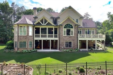 Welcome to this exceptional 3-sided brick and stone executive on Hamilton Mill Golf Club in Georgia - for sale on GolfHomes.com, golf home, golf lot