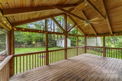 Views of Lake Tomahawk! This charming 2-bedroom/1-bath cottage on Black Mountain Golf Course in North Carolina - for sale on GolfHomes.com, golf home, golf lot