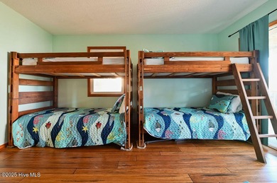 Sitting well elevated in an X flood zone, Sunny Days is located on The Currituck Golf Club in North Carolina - for sale on GolfHomes.com, golf home, golf lot