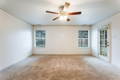 Tucked into a prime corner lot inside the gated paradise of on Pecan Plantation Country Club in Texas - for sale on GolfHomes.com, golf home, golf lot