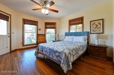 Sitting well elevated in an X flood zone, Sunny Days is located on The Currituck Golf Club in North Carolina - for sale on GolfHomes.com, golf home, golf lot