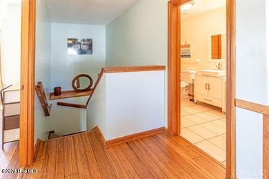 Sitting well elevated in an X flood zone, Sunny Days is located on The Currituck Golf Club in North Carolina - for sale on GolfHomes.com, golf home, golf lot