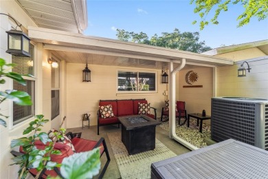 PRICE ADJUSTMENT - Renovated Augusta Villa | End Unit | Park on On Top of the World Golf Course in Florida - for sale on GolfHomes.com, golf home, golf lot