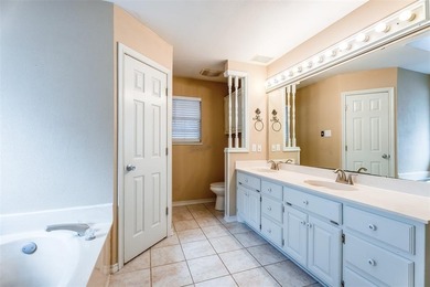 Tucked into a prime corner lot inside the gated paradise of on Pecan Plantation Country Club in Texas - for sale on GolfHomes.com, golf home, golf lot