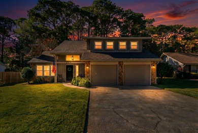 Welcome to your dream home, tucked away on a quiet street in the on Golf Club at Bluewater Bay Resort in Florida - for sale on GolfHomes.com, golf home, golf lot