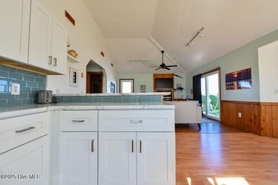 Sitting well elevated in an X flood zone, Sunny Days is located on The Currituck Golf Club in North Carolina - for sale on GolfHomes.com, golf home, golf lot