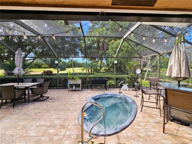 Welcome to your charming Tamarac retreat! This lovely on Woodmont Country Club in Florida - for sale on GolfHomes.com, golf home, golf lot