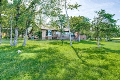 Stunning Lakefront property in the private, gated community of on Lake Kiowa Golf Course in Texas - for sale on GolfHomes.com, golf home, golf lot