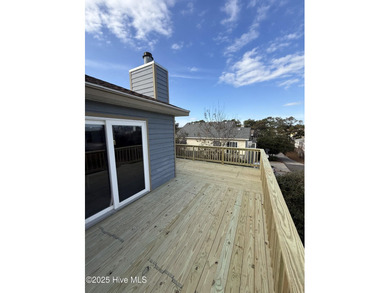Sitting well elevated in an X flood zone, Sunny Days is located on The Currituck Golf Club in North Carolina - for sale on GolfHomes.com, golf home, golf lot
