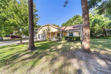 PRICE ADJUSTMENT - Renovated Augusta Villa | End Unit | Park on On Top of the World Golf Course in Florida - for sale on GolfHomes.com, golf home, golf lot