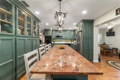PRICE ADJUSTMENT - Renovated Augusta Villa | End Unit | Park on On Top of the World Golf Course in Florida - for sale on GolfHomes.com, golf home, golf lot