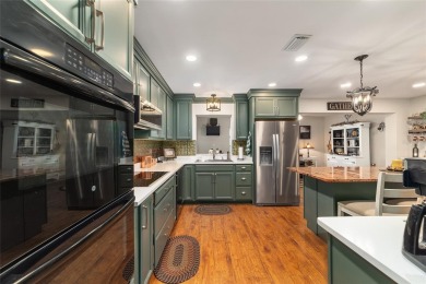 PRICE ADJUSTMENT - Renovated Augusta Villa | End Unit | Park on On Top of the World Golf Course in Florida - for sale on GolfHomes.com, golf home, golf lot