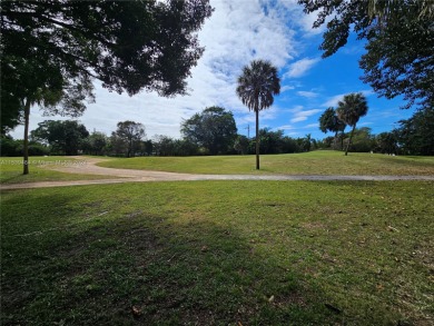 Welcome to your charming Tamarac retreat! This lovely on Woodmont Country Club in Florida - for sale on GolfHomes.com, golf home, golf lot