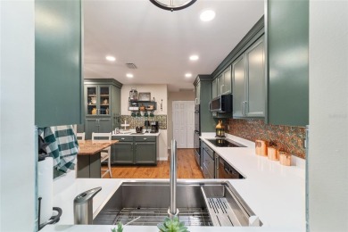 PRICE ADJUSTMENT - Renovated Augusta Villa | End Unit | Park on On Top of the World Golf Course in Florida - for sale on GolfHomes.com, golf home, golf lot