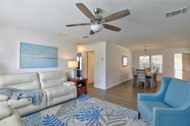 Beautifully maintained 2021 home offering over 2,000 sq ft of on Barefoot Bay Golf Course in Florida - for sale on GolfHomes.com, golf home, golf lot