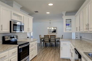 Beautifully maintained 2021 home offering over 2,000 sq ft of on Barefoot Bay Golf Course in Florida - for sale on GolfHomes.com, golf home, golf lot