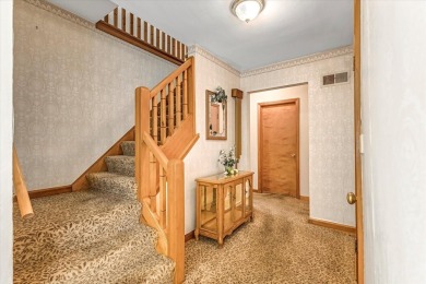 Charming midcentury brick colonial on coveted Lake Dr offers on Grant Park Golf Course in Wisconsin - for sale on GolfHomes.com, golf home, golf lot