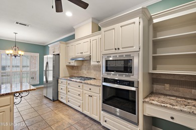 Experience upscale living at this beautiful home located in the on Colonial Country Club Deerfield in Mississippi - for sale on GolfHomes.com, golf home, golf lot