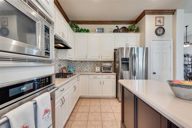 Welcome to this stunning 4-bedroom, 3.5 bath home offering 3,381 on The Shores Country Club in Texas - for sale on GolfHomes.com, golf home, golf lot