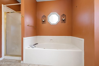 Experience upscale living at this beautiful home located in the on Colonial Country Club Deerfield in Mississippi - for sale on GolfHomes.com, golf home, golf lot