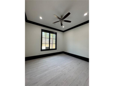 Welcome to 20 Club Drive in Jesup, a stunning luxury residence on Pine Forest Country Club in Georgia - for sale on GolfHomes.com, golf home, golf lot